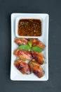 Grilled Chicken Wings with Red Spicy Thai styl Royalty Free Stock Photo