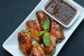 Grilled Chicken Wings with Red Spicy Thai style Royalty Free Stock Photo