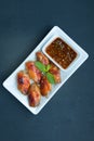 Grilled Chicken Wings with Red Spicy Thai style Royalty Free Stock Photo