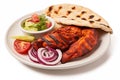 Grilled chicken wings with vegetables and pita bread isolated on white background Royalty Free Stock Photo