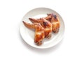 Grilled chicken wings on white plate Royalty Free Stock Photo