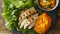 Grilled chicken wrap with lettuce and carrot puree Royalty Free Stock Photo