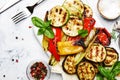 Grilled colorful vegetables, aubergines, zucchini, pepper with s