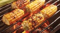 Grilled corn on the cob on a barbecue grill with flames visible underneath Royalty Free Stock Photo