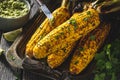 Grilled Corn On Cob On Barbecue with herbs Butter