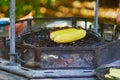 Grilled corn on the cob with butter and salt on the grill plate Royalty Free Stock Photo