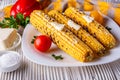 Grilled corn cob on white wooden rustic background Royalty Free Stock Photo