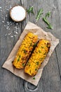 Grilled corn cobs on wooden background Royalty Free Stock Photo