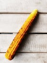 Ear of grilledcorn on a table Royalty Free Stock Photo