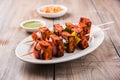 Grilled cottage cheese or also known as Paneer Tikka Kebab or chili paneer or chilli paneer or tandoori paneer in india India, bar Royalty Free Stock Photo