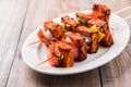 Grilled cottage cheese or also known as Paneer Tikka Kebab or chili paneer or chilli paneer or tandoori paneer in india India, bar Royalty Free Stock Photo