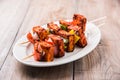 Grilled cottage cheese or also known as Paneer Tikka Kebab or chili paneer or chilli paneer or tandoori paneer in india India, bar