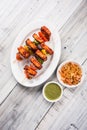 Grilled cottage cheese or also known as Paneer Tikka Kebab or chili paneer or chilli paneer or tandoori paneer in india India, bar Royalty Free Stock Photo