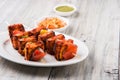 Grilled cottage cheese or also known as Paneer Tikka Kebab or chili paneer or chilli paneer or tandoori paneer in india India, bar