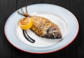 Grilled dorado fish with lemon and truffle sauce Royalty Free Stock Photo