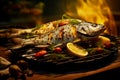 Grilled Dorado fish, sea bream with the addition of spices, herbs and lemon on the grill plate. Fried fish with vegetables