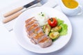 Grilled duck with mashed cauliflower, fried brussels sprouts and orange sauce on a white plate. Royalty Free Stock Photo