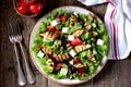 Grilled eggplant salad, tomatoes, feta and lettuce with olive oil and red balsamic, sea salt and pink pepper. Royalty Free Stock Photo