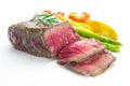 Grilled fillet steak served with tomatoes and roast vegetables