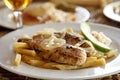 Grilled fish and chips on a plate, shallow DOF Royalty Free Stock Photo