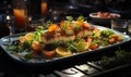 Grilled fish fillet with lemon and vegetables on a restaurant table.