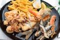 Fried seafood mixture plate, mediterranean cuisine Royalty Free Stock Photo