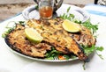 Grilled fish with greens