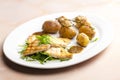grilled fish with grilled potatoes Royalty Free Stock Photo