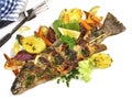 Grilled Fish - Rainbow Trout with Vegetables and Potatoes Royalty Free Stock Photo