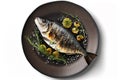 grilled fish served with lemon and herbs