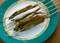 Grilled fish on a stick
