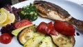 Grilled fish with various vegetables Royalty Free Stock Photo