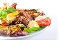 Grilled fish with vegetables on plate Isolated on Royalty Free Stock Photo