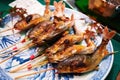 Grilled fishes on sticks as street food at Nishiki market, Kyoto Royalty Free Stock Photo