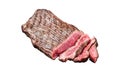 Grilled Flap or Flank Steak, sliced on a plate. Isolated, white background. Royalty Free Stock Photo