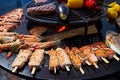 Grilled fresh seafood: prawns, fish, octopus, oysters food background Barbecue Cooking BBQ Royalty Free Stock Photo