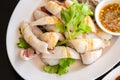 Grilled fresh squid, Close up Thai food Grilled fresh squid in white plate with spicy and sour sauce or seafood sauce, top view Royalty Free Stock Photo