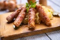 Grilled german sausage links with sauerkraut