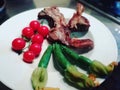 Grilled grassfed organic lamb chops with vine tomatoes and zuchinni chef plate