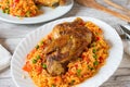 Grilled half chicken with tomato vegetable rice