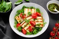 Grilled Halloumi Cheese with Cheery Tomatoes and Pesto with Arugula, Spinach, and Basil, Ketogenic Paleo Diet Lunch