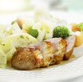 Grilled ham served with cauliflower broccoli carrot and potatoe Royalty Free Stock Photo