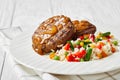 Grilled hamburger steaks with brown onion gravy