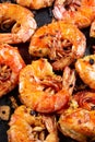 Grilled headless langoustines with chunks of garlic