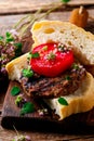 Grilled herbed burger.style rustic .selective focus Royalty Free Stock Photo