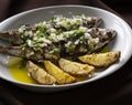 Grilled Horse Mackerel with Green Sauce and Potatoes is a typical plate from Mediterranean Food. Royalty Free Stock Photo