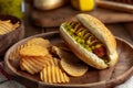 Grilled Hot Dog and Potato Chips Royalty Free Stock Photo