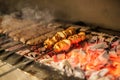 Grilled Hot Dogs and Sausages Cooking on the Grill Royalty Free Stock Photo