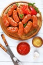 Grilled juicy beef sausages, top view Royalty Free Stock Photo