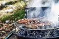 Grilled kebab cooking on metal skewer. Roasted meat cooked at barbecue. BBQ fresh beef meat chop slices. Traditional Royalty Free Stock Photo
